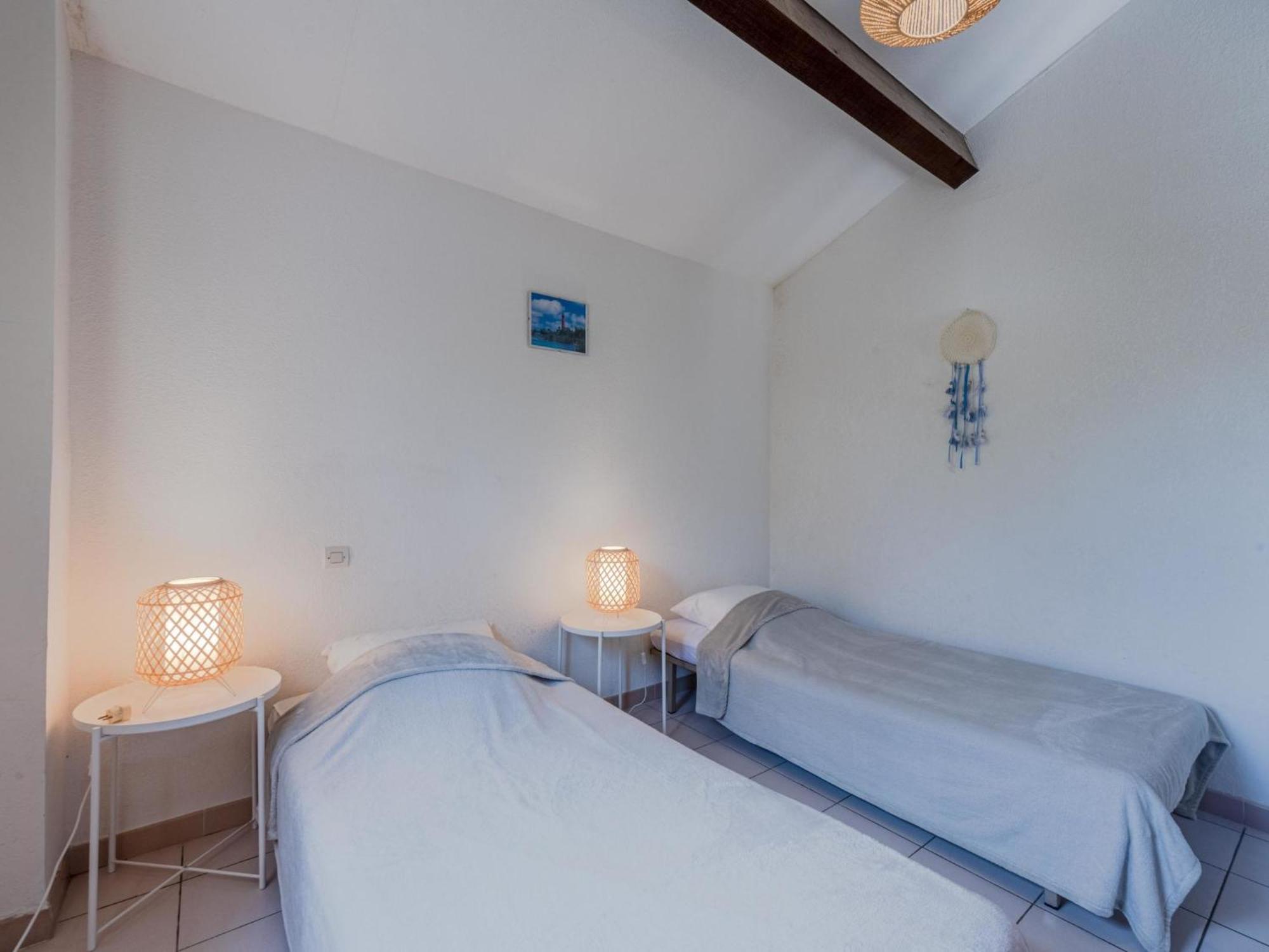 Holiday Home Hameau Des Tamarins-2 By Interhome เลอบาร์กาแรส ภายนอก รูปภาพ