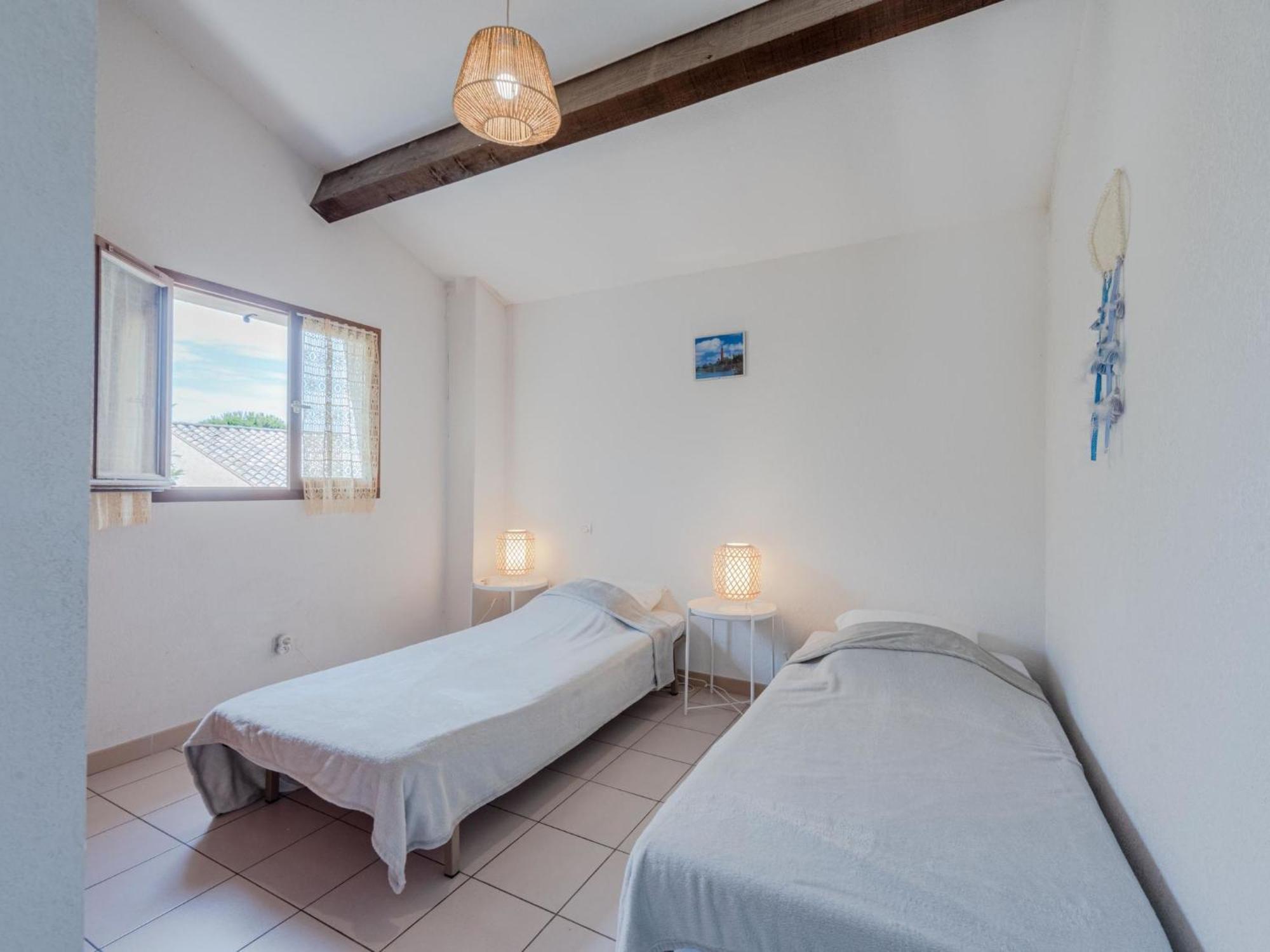Holiday Home Hameau Des Tamarins-2 By Interhome เลอบาร์กาแรส ภายนอก รูปภาพ